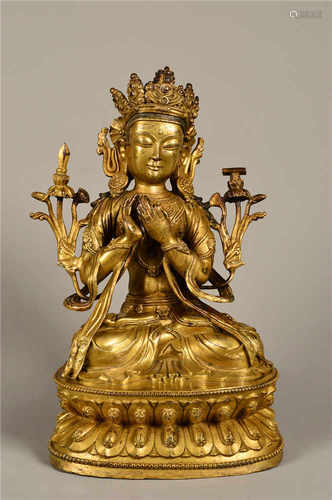 A gilded bronze white tara statue