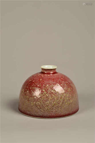 A coral red glazed water pot