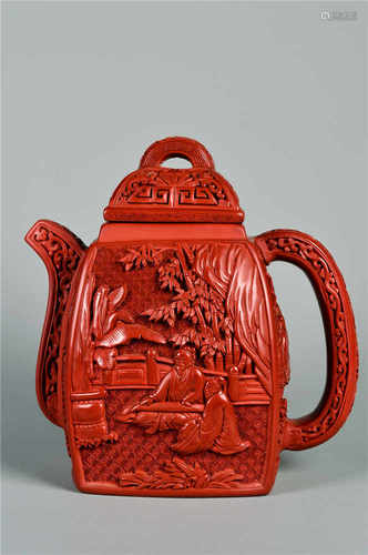 A Yixing teapot with carved lacquer decoration