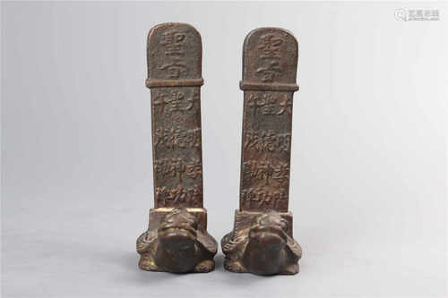 A pair of bronze turtle plaques