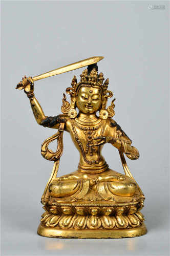 A gilded bronze buddha statue