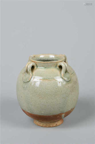 A green glazed jar