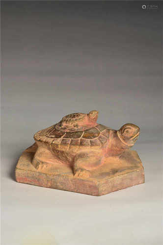 A stone carved turtle