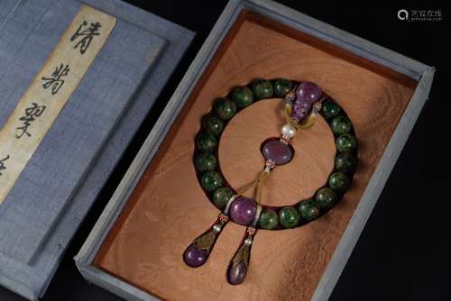 Green Jade Holding Ornament from Qing