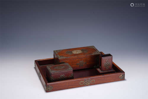 A GROUP OF CHINESE CARVED HARDWOOD SMOKING SETS