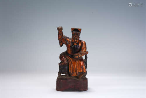 A CHINESE GOLD PAINTED WOOD CARVED BUDDHA