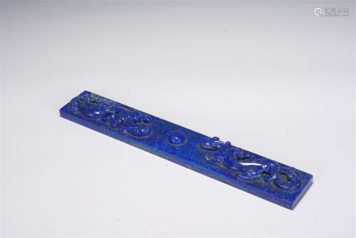 A CHINESE CARVED LAPIS LAZULI PAPERWEIGHT