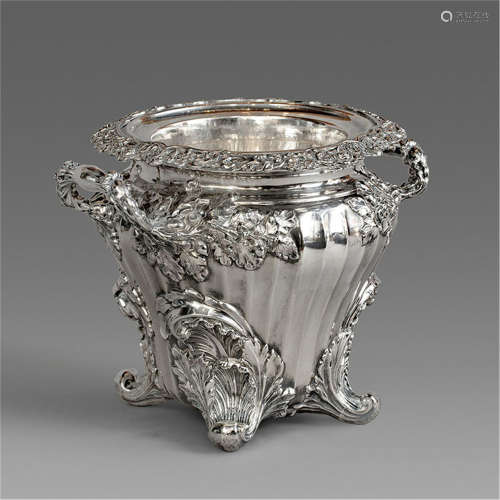 A SILVER PLATED CARVED ICE BUCKET