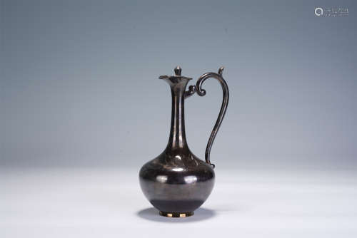 A CHINESE SILVER EWER WITH COVER