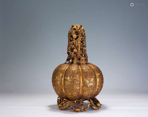 A CHINESE CARVED GILT BRONZE VASE