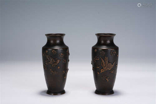 A PAIR OF CHINESE CARVED BRONZE VASES