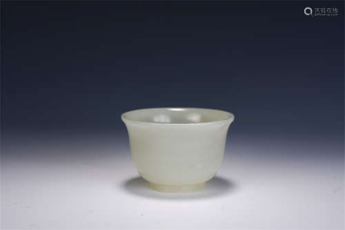 A CHINESE CARVED WHITE JADE CUP