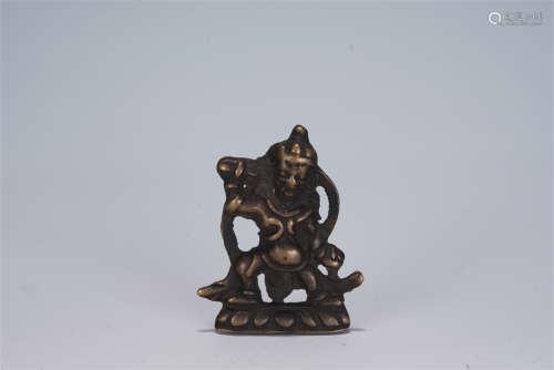 A CHINESE CARVED BRONZE PORTABLE BUDDHA