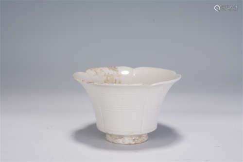 A CHINESE DING-TYPE GLAZED PORCELAIN CUP