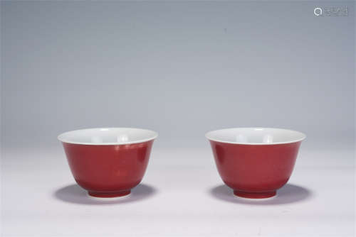 A PAIR OF CHINESE RED GLAZED PORCELAIN CUPS