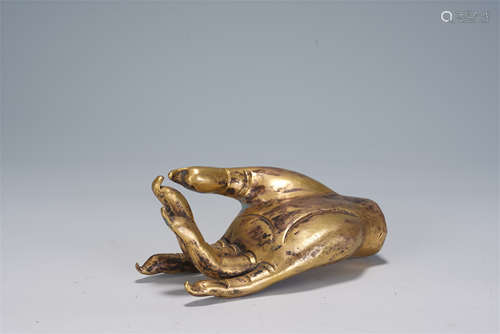 A CHINESE GILT BRONZE BUDDHA HAND