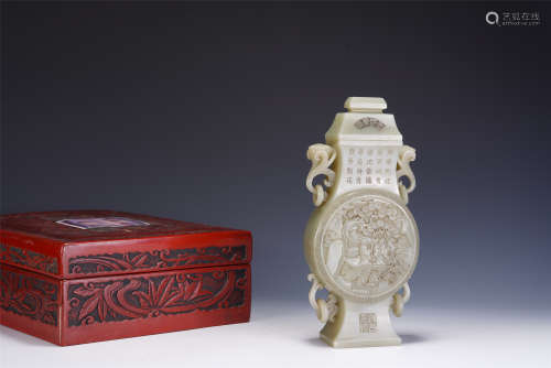 A CHINESE CARVED WHITE JADE VASE