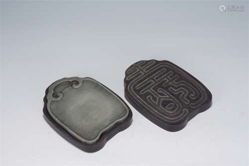 A CHINESE CARVED SONG-HUA INKSTONE