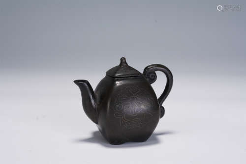 A CHINESE BRONZE TEA POT WITH SILVER INLAIDED