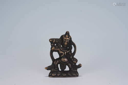 A CHINESE CARVED BRONZE PORTABLE BUDDHA