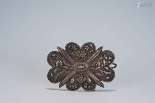 A CHINESE CARVED SILVER DECORATION