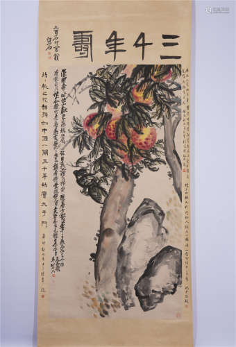A CHINESE HANGING SCROLL PAINTING OF PEACHES