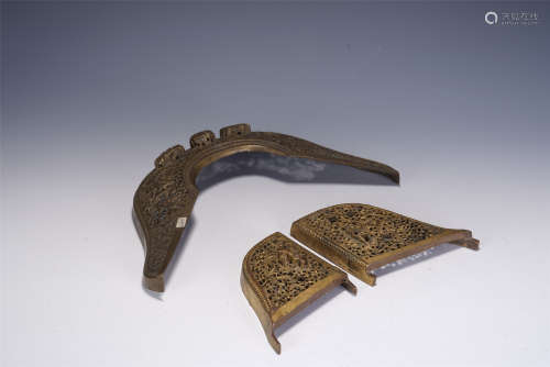 A PAIR OF CHINESE CARVED GILT BRONZE SADDLE FITTINGS