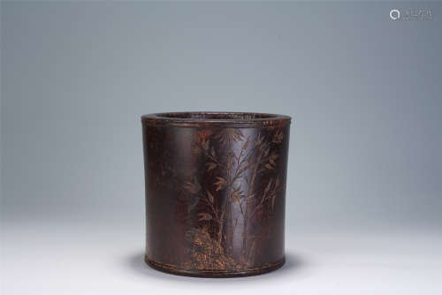 A CHINESE CARVED HARDWOOD BRUSH POT