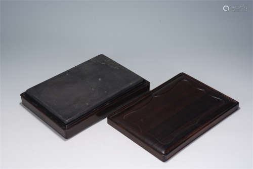A CHINESE CARVED DUAN INKSTONE WITH MATCHING BOX