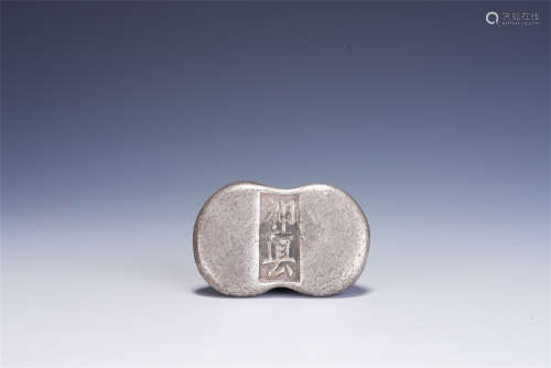 A CHINESE SILVER INGOT