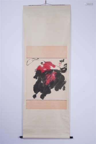 A CHINESE HANGING SCROLL PAINTING OF RIDING HORSE
