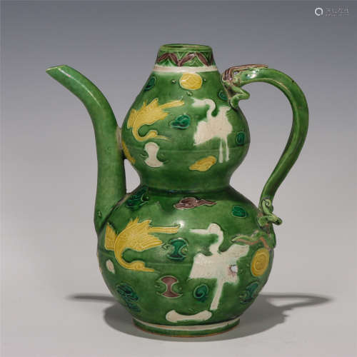 A CHINESE GREEN GLAZED DOUBLE GOURD WINEPOT
