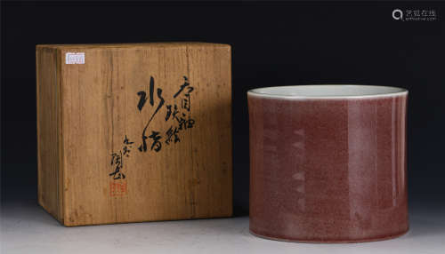 A CHINESE RED GLAZED PORCELAIN BRUSH POT
