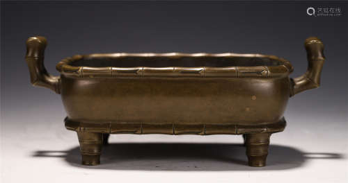 A CHINESE BRONZE SAUQRE CENSER
