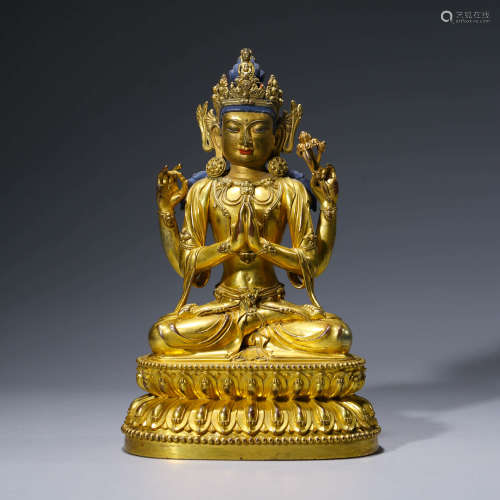A Gild Bronze Statue of Four Arms Guanyin