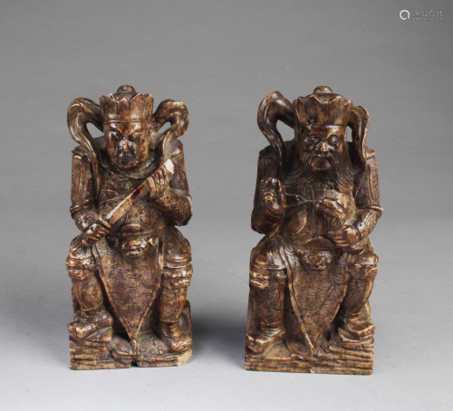 A Pair of Stone Figurines