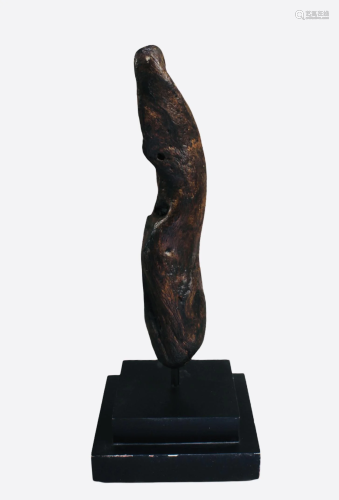 A Carved QiMu Sculpture