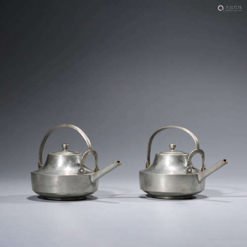 A Pair of Tin Pots