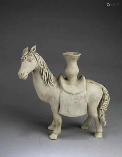 A Porcelain Horse Figurine