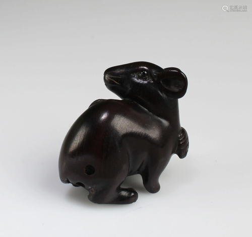 A Carved Wooden Animal Figurine