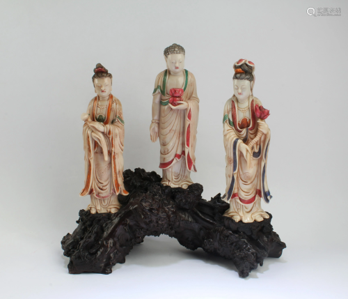 A Group of Three Soapstone Statues