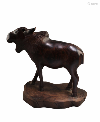 A Carved Wooden Animal Figurine