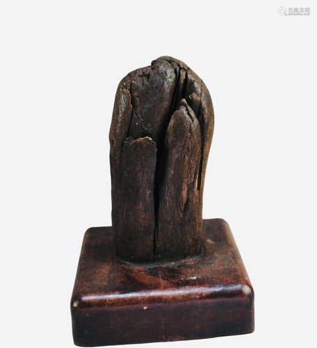 A Carved QiMu Sculpture