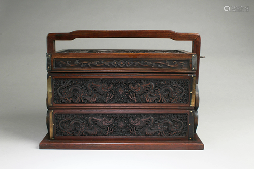 A Carved Wooden Multi-Tier Container