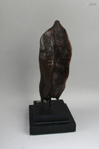 A Carved QiMu Sculpture