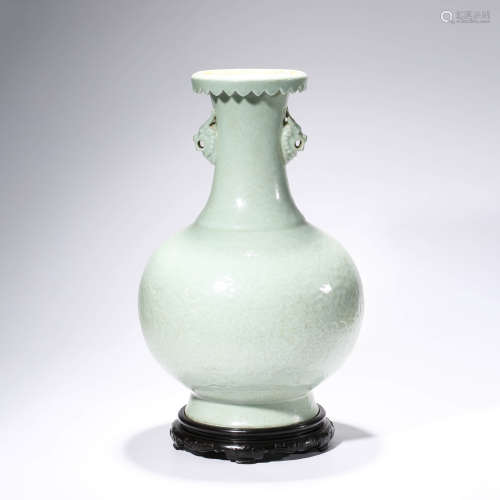 A Celadon Glaze Twining Lotus Pattern Relief Porcelain Double Dragon Ears Vase
