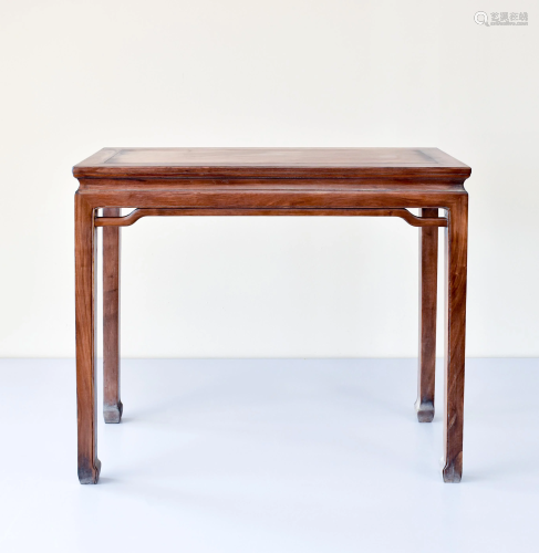 A FINE CHINESE HUANGHUALI WAISTED SIDE TABLE