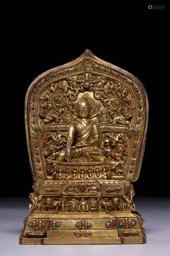 GILT BRONZE CAST AND CARVED 'GURU' SEATED FIGURE WITH MANDORLA