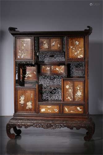 A Chinese Carved Hardwood Cabinet