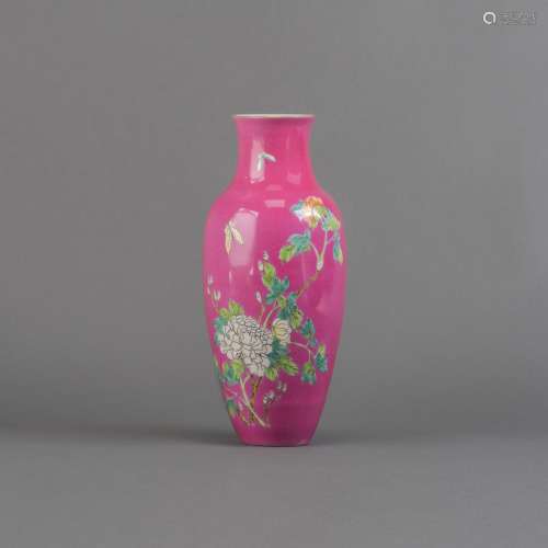 A RUBY-GROUND FAMILLE ROSE 'PEONY' VASE, WITH QIANLONG MARK